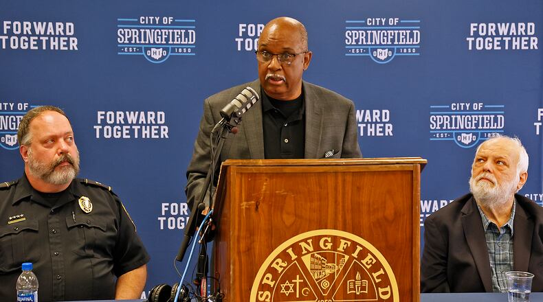 James Bacon, from the Community Police Advisory Board, speaks during a press conference this year in regards to the death of Eric Cole. BILL LACKEY/STAFF