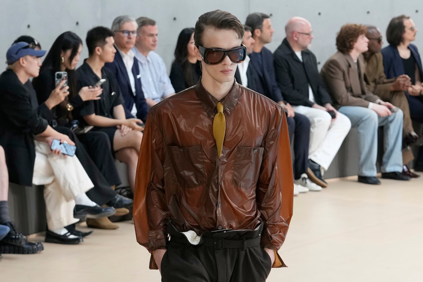 A model wears a creation as part of the men's Saint Laurent Spring-Summer 2026 collection, that was presented in Paris, Tuesday, June 24, 2025. (AP Photo/Michel Euler)