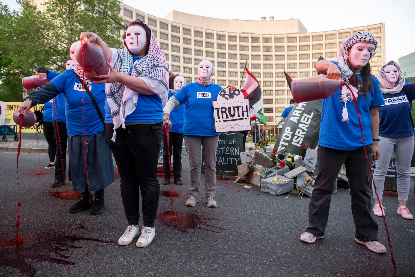Pro-Palestinian protesters rally outside the Washington Hilton during the White House Correspondents Dinner, Saturday, April 26, 2025, in Washington. (AP Photo/Kevin Wolf)