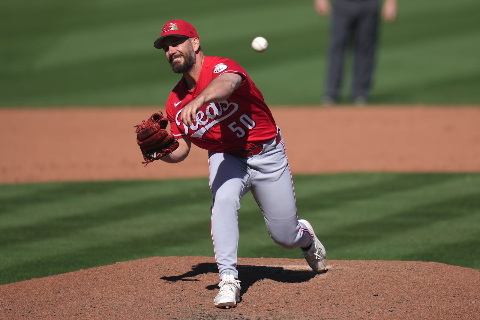 Cincinnati Reds pitcher Sam Moll throws against the San Francisco Giants during the fifth inning of a spring training baseball game Friday, March 6, 2026, in Scottsdale, Ariz. (AP Photo/Ross D. Franklin)