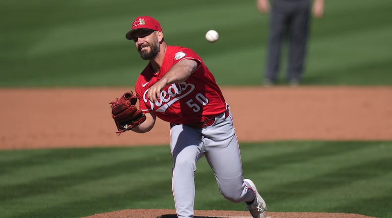 Cincinnati Reds pitcher Sam Moll throws against the San Francisco Giants during the fifth inning of a spring training baseball game Friday, March 6, 2026, in Scottsdale, Ariz. (AP Photo/Ross D. Franklin)