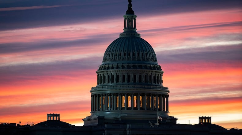 FILE — The U.S. Capitol at sunrise, in Washington, Jan. 6, 2022. Democratic candidates in 2022 have focused on bread-and-butter economic issues while ceding the political turf on the structure of American democracy and voting rights to Republicans, who are powered by a former president and many base voters who believe the 2020 contest was illegitimate. (Al Drago/The New York Times)