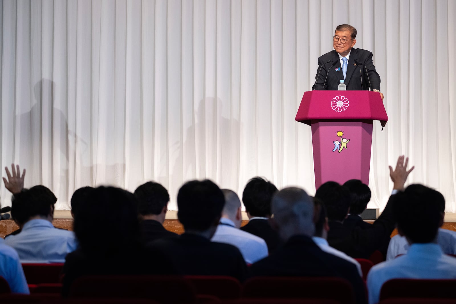 Japan's Prime Minister Shigeru Ishiba attends a press conference at the headquarters of the Liberal Democratic Party (LDP) in Tokyo Monday, July 21, 2025 after the prime minister's ruling coalition failed to secure a majority in the upper house in a parliamentary election. (Philip Fong/Pool Photo via AP)