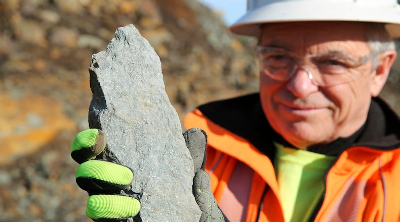 Joel Rheault, vice president of operations for Titan Mining Corp., holds a rock containing graphite at a mine, Nov. 20, 2025, in Gouverneur, N.Y. (AP Photo/Michael Hill)