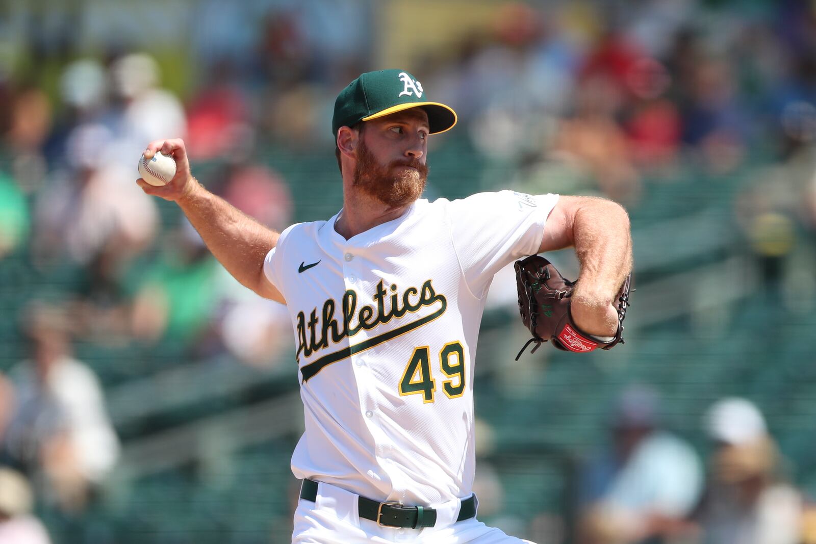 Athletics pitcher Michael Kelly throws to a Minnesota Twins batter during the seventh inning of a baseball game Thursday, June 5, 2025, in West Sacramento, Calif. (AP Photo/Scott Marshall)
