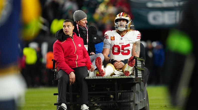 San Francisco 49ers tight end George Kittle (85) is carted off the field after an injury during the first half of an NFL wild-card playoff football game against the Philadelphia Eagles on Sunday, Jan. 11, 2026, in Philadelphia. (AP Photo/Derik Hamilton)
