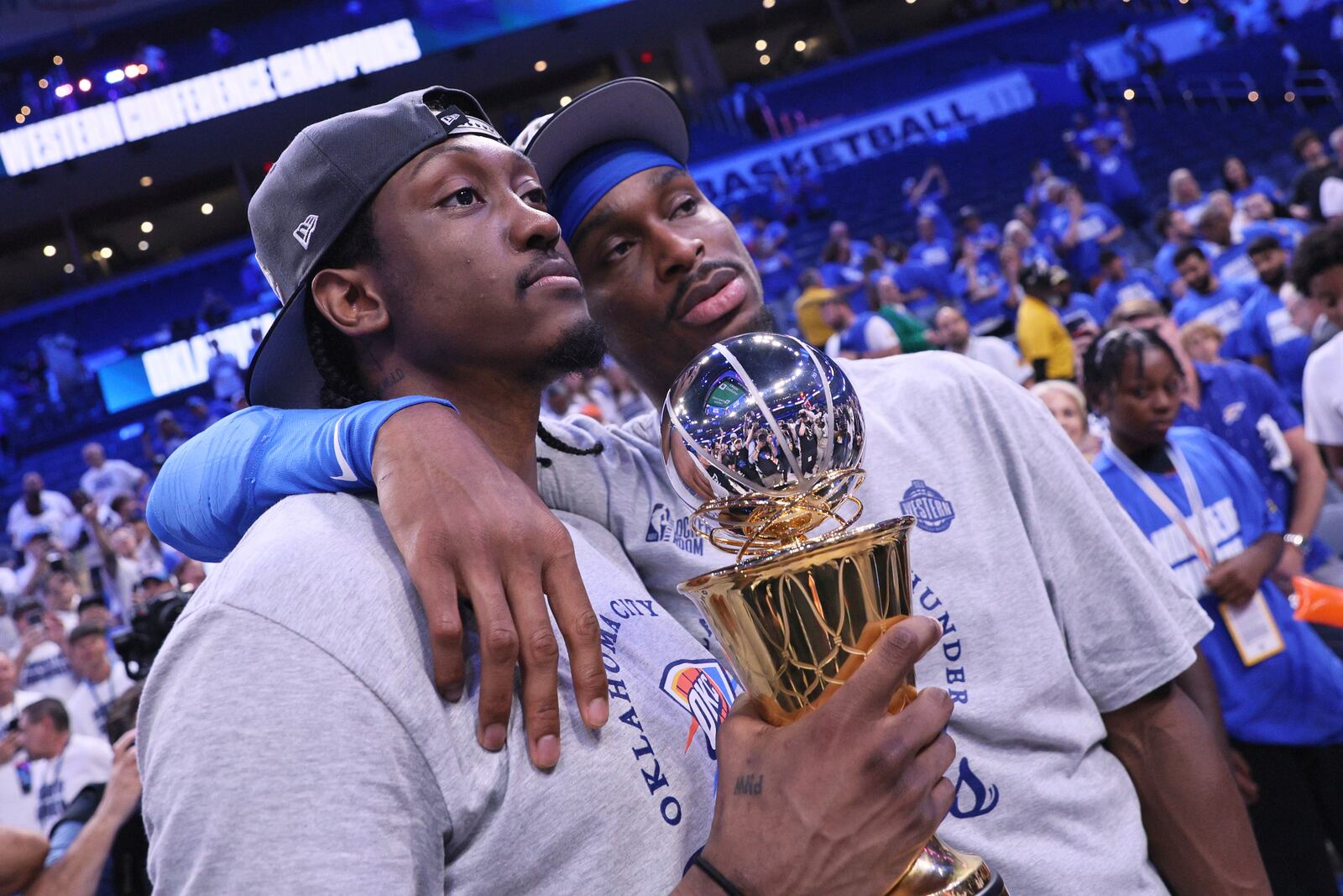 Oklahoma City Thunder forward Jalen Williams (8), left, and Oklahoma City Thunder guard Shai Gilgeous-Alexander (2) pose for a photo after Game 5 of the Western Conference finals of the NBA basketball playoffs against the Minnesota Timberwolves, Wednesday, May 28, 2025, in Oklahoma City. (AP Photo/Nate Billings)