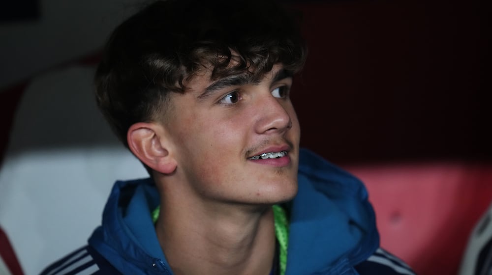 Arsenal's Max Dowman sits on the bench prior to the Champions League opening phase soccer match between Slavia Prague and Arsenal in Prague, Czech Republic, Tuesday, Nov. 4, 2025. (AP Photo/Petr David Josek)