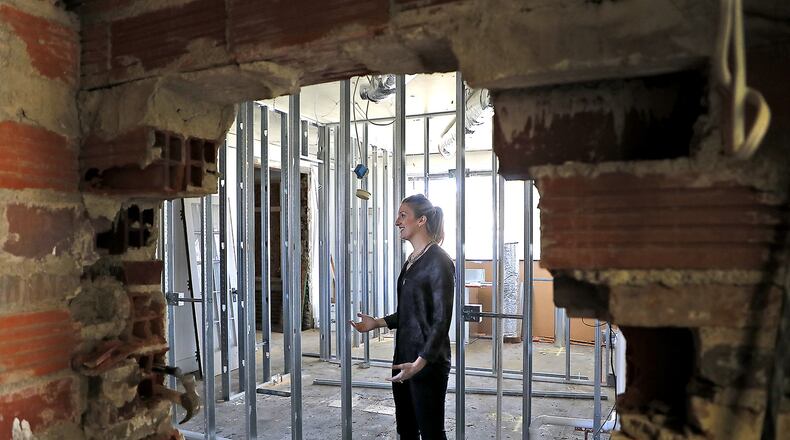 Dr. Jessica Kile and her husband are turning a historic buiding in Urbana into the home of Urbana Dental Smiles. Bill Lackey/Staff