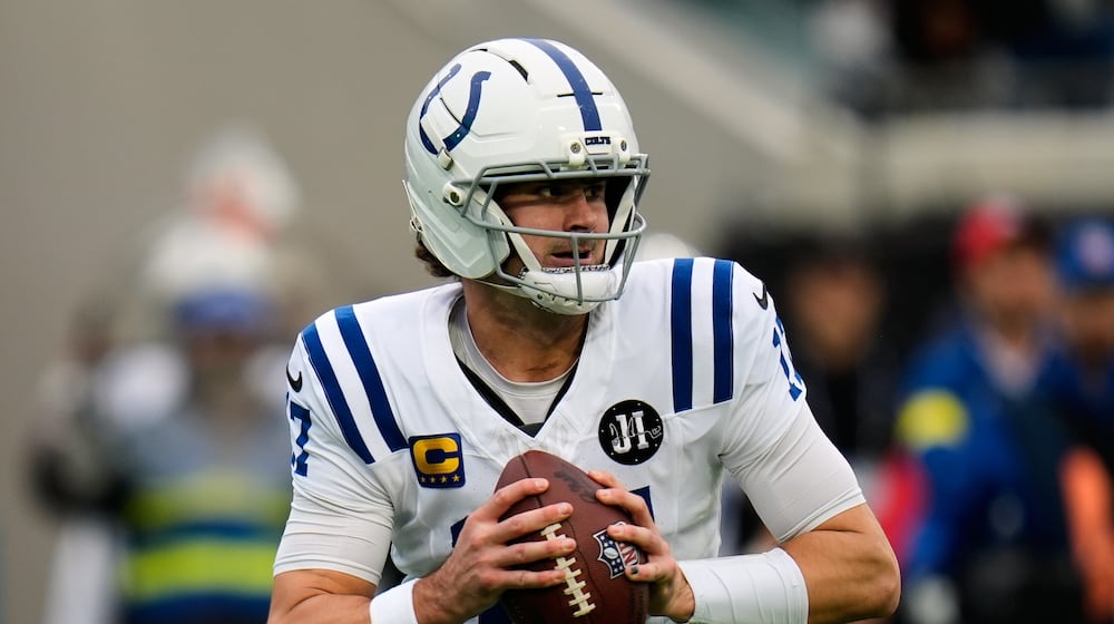 FILE - Indianapolis Colts quarterback Daniel Jones looks for a receiver during the first half of an NFL football game against the Jacksonville Jaguars, Dec. 7, 2025, in Jacksonville, Fla. (AP Photo/John Raoux, File)