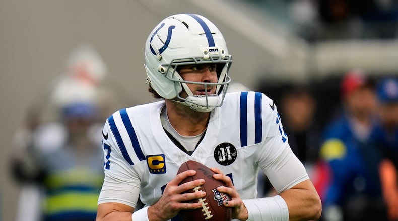 FILE - Indianapolis Colts quarterback Daniel Jones looks for a receiver during the first half of an NFL football game against the Jacksonville Jaguars, Dec. 7, 2025, in Jacksonville, Fla. (AP Photo/John Raoux, File)
