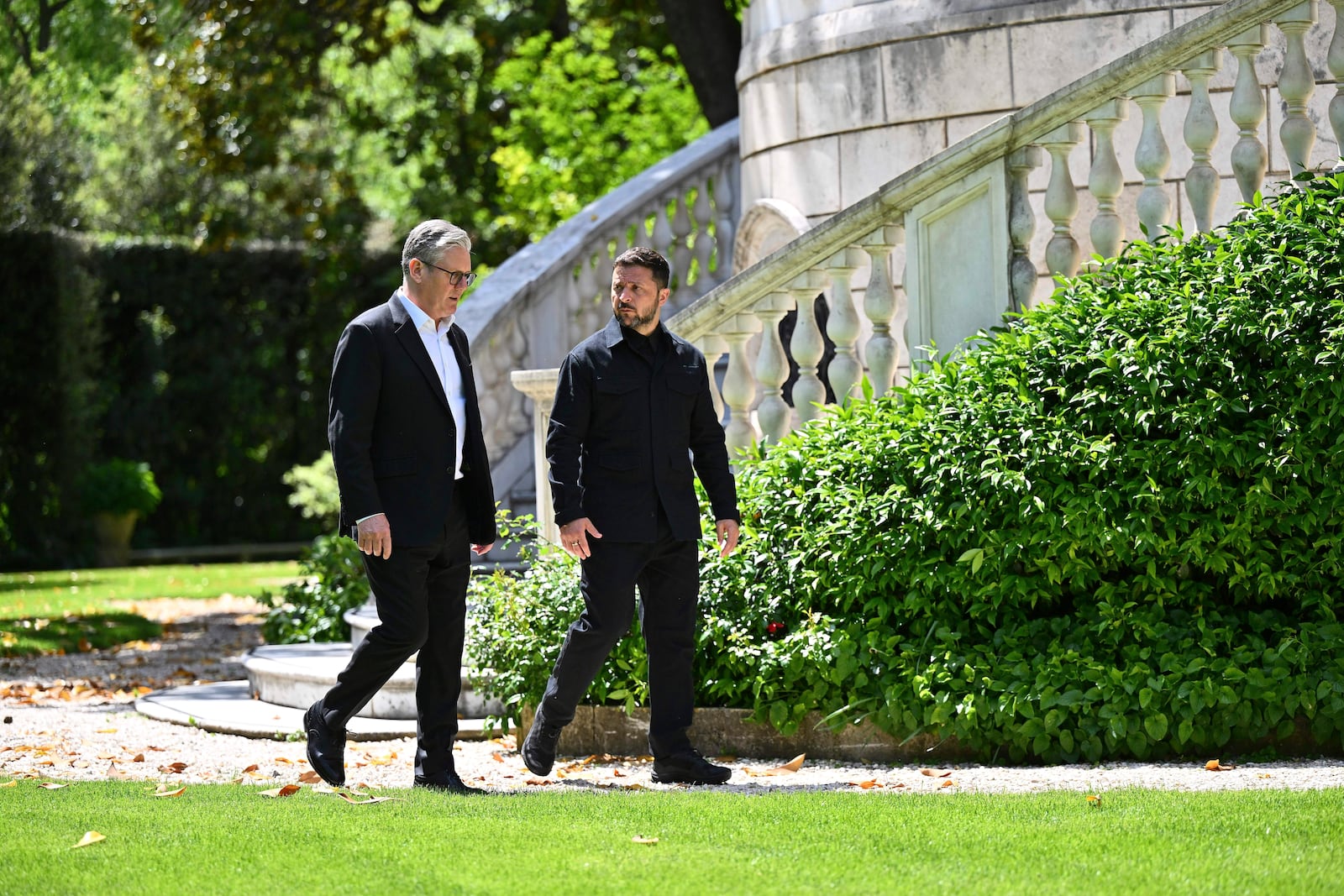 Britain's Prime Minister Keir Starmer, left, and President of Ukraine Volodymyr Zelenskyy walk through the gardens at The Villa Wolkonsky in Rome, Italy, during a bilateral meeting, Saturday April 26, 2025. (Marco M. Mantovani/Getty Images)