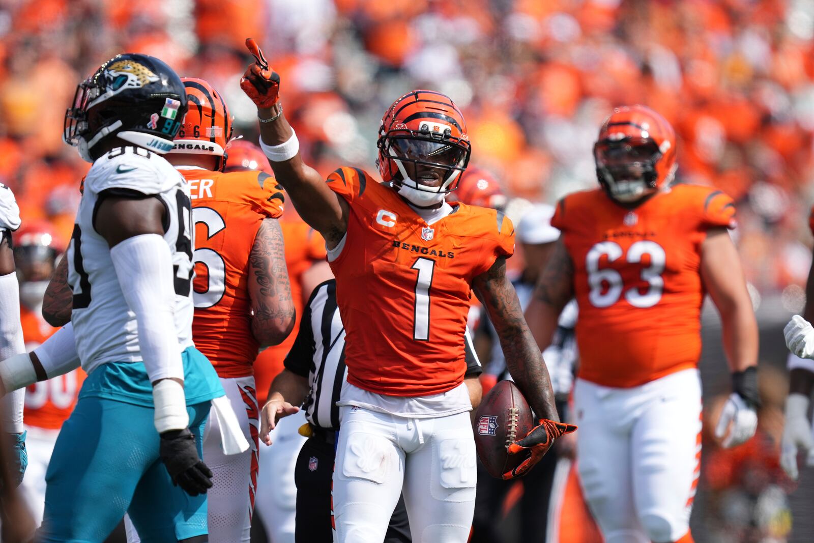 Cincinnati Bengals wide receiver Ja'Marr Chase (1) signals for a first down during the second half of an NFL football game against the Jacksonville Jaguars, Sunday, Sept. 14, 2025, in Cincinnati. (AP Photo/Jeff Dean)