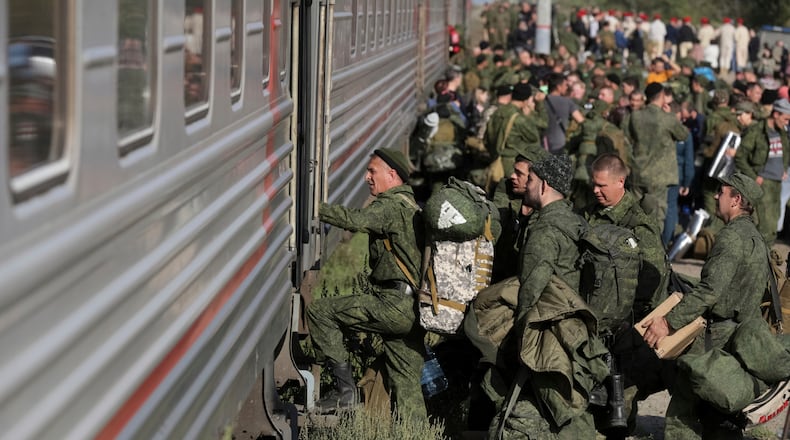 FILE - Russian recruits take a train at a railway station in Prudboi in the Volgograd region of Russia, Sept. 29, 2022. (AP Photo, File)