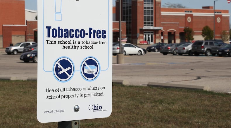Tecumseh Schools has “Tobacco-Free” signs up around their campus. BILL LACKEY/STAFF