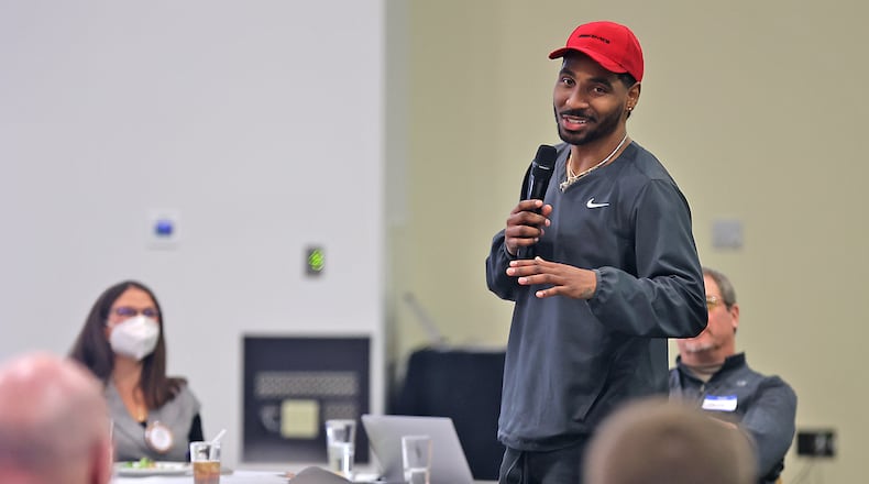 Springfield native and former Ohio State quarterback Braxton Miller talks to the Springfield Rotary Club about helping local kids through the The Braxton Miller Foundation Monday. BILL LACKEY/STAFF