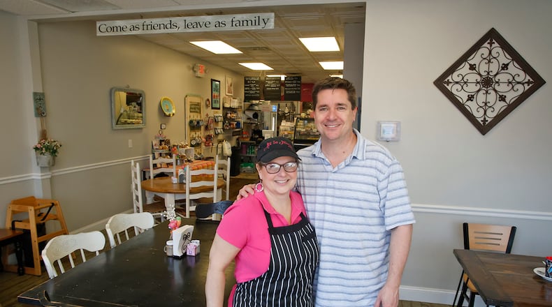 Samantha and Rick Jones, the owners of All in Flavor Cafe and Sweets in South Charleston, reopened Tuesday, Feb. 27, 2024 after closing in October of last year. BILL LACKEY/STAFF