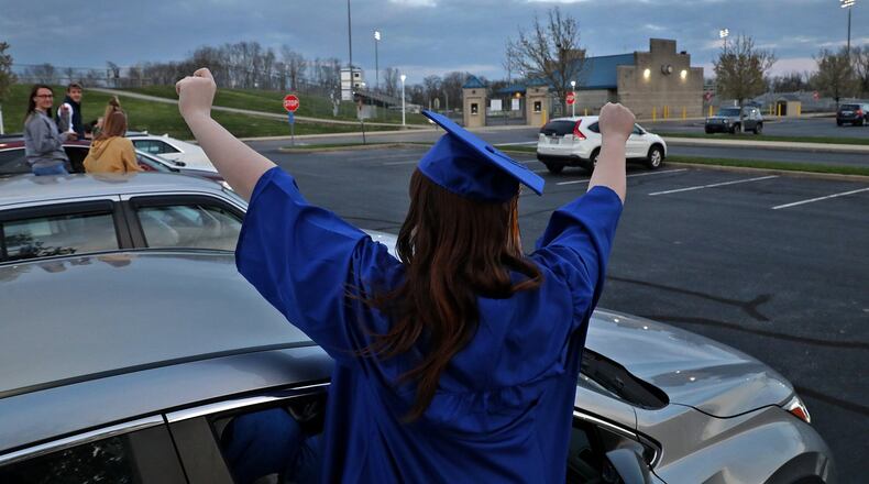 Health experts ask parents to keep their eyes on teens who have missed out on some of the milestones of their teen life such as traditional graduation ceremonies, proms and other senior events due to the coronavirus pandemic. BILL LACKEY/STAFF