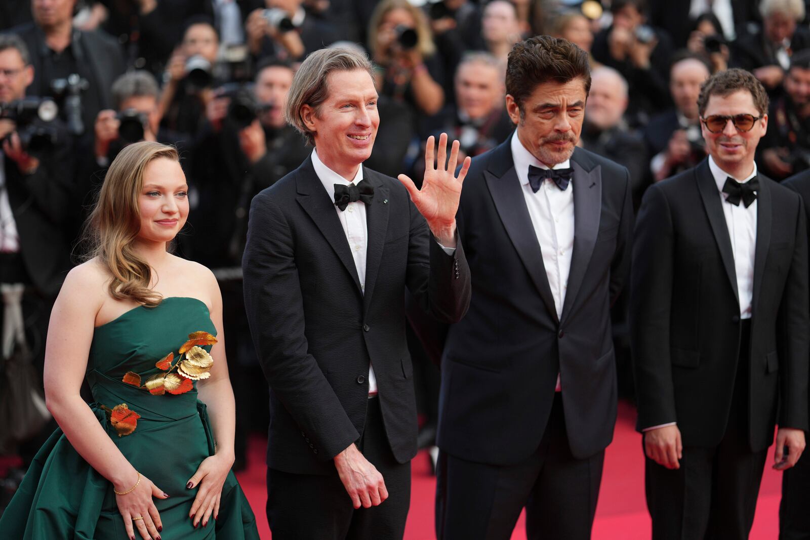 Mia Threapleton, from left, director Wes Anderson, Benicio del Toro and Michael Cera pose for photographers upon arrival at the premiere of the film 'The Phoenician Scheme' at the 78th international film festival, Cannes, southern France, Sunday, May 18, 2025. (Photo by Lewis Joly/Invision/AP)