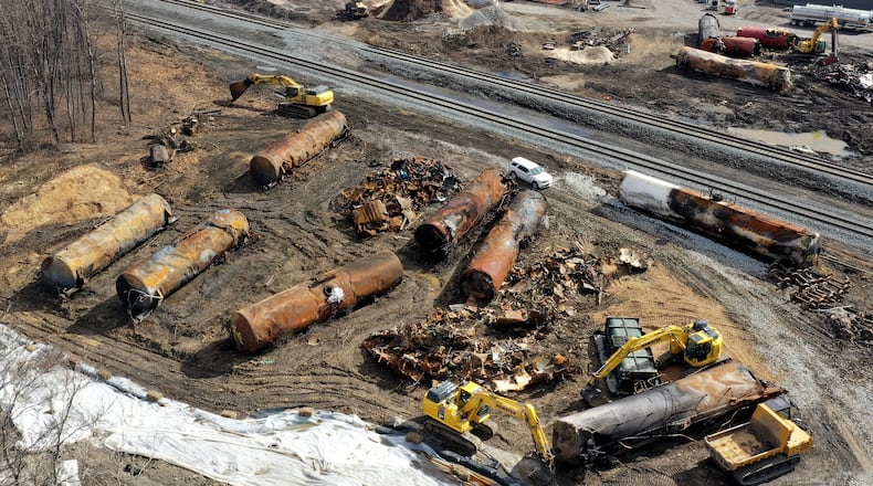 A view of the scene Friday, Feb. 24, 2023, as the cleanup continues at the site of of a Norfolk Southern freight train derailment that happened on Feb. 3 in East Palestine, Ohio. (AP Photo/Matt Freed)