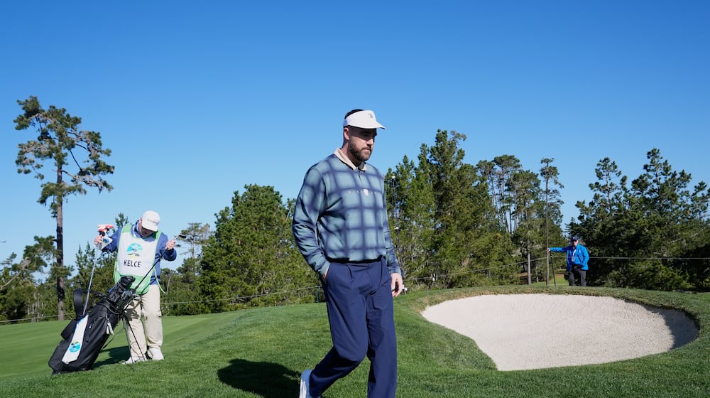 Kansas City Chiefs' Travis Kelce walks off the tenth green at Spyglass Hill Golf Course during the first round of the AT&T Pebble Beach Pro-Am golf tournament in Pebble Beach, Calif., Thursday, Feb. 12, 2026. (AP Photo/Godofredo A. Vásquez)