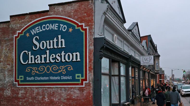 The Christmas in South Charleston celebration was held Wednesday night, Dec. 7, 2022. The village is preparing warming centers this week because of recent power outages that AES Ohio crews are working to repair. BILL LACKEY/STAFF