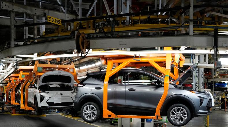 FILE - Vehicles move along the 2023 Chevrolet Bolt EV and EUV assembly line at the General Motors Orion Assembly June 15, 2023, in Lake Orion, Mich. (AP Photo/Carlos Osorio, File)