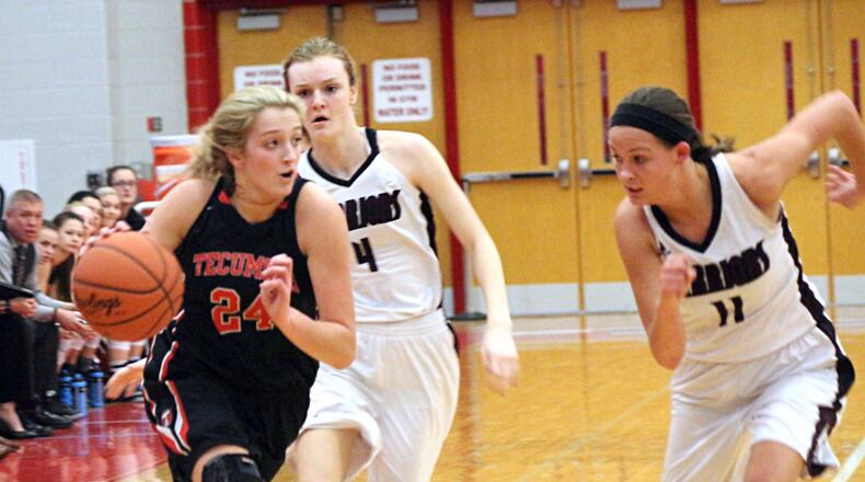 Tecumseh junior Presley Griffitts (24) scored 23 points as No. 7 Tecumseh beat No. 3 Lebanon 64-58 in the D-I sectional on Tuesday at Troy. GREG BILLING / CONTRIBUTED