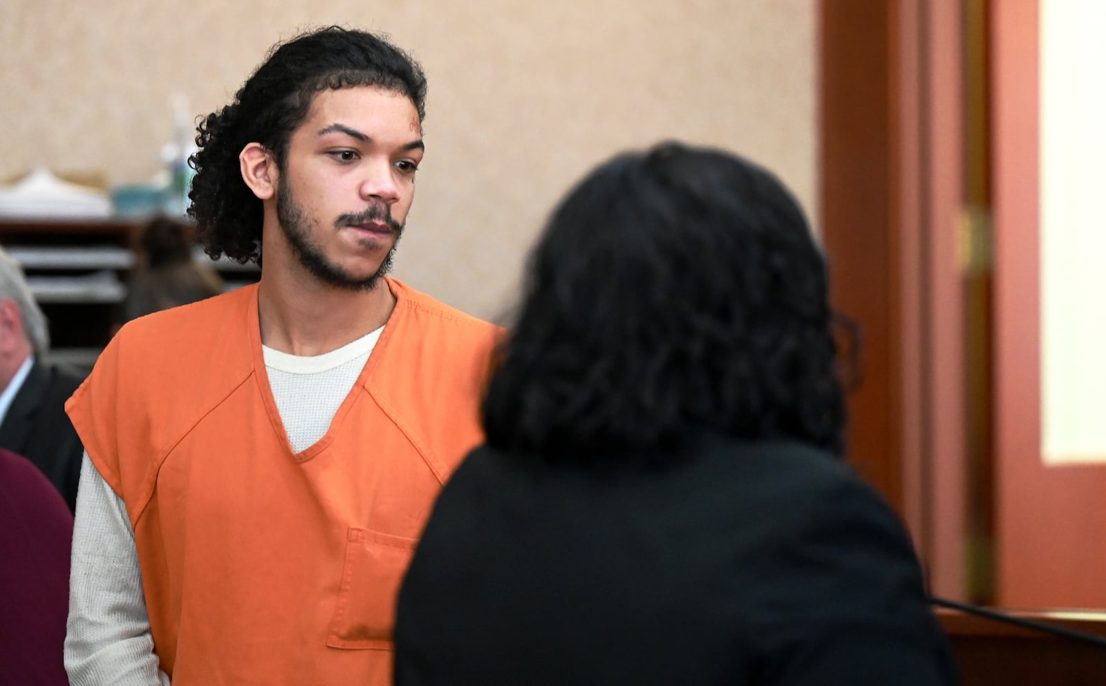 Dominick Grubb, 18, of Hamilton, pleaded guilty on July 3, 2025, to aggravated burglary and conspiracy to commit murder, both of which are first-degree felonies. He faces up to 16-1/2 years for each charge. Pictured is Grubb with his attorney, Arica Underwood, at a March court appearance before Butler County Common Pleas Judge Jennifer McElfresh, who combined both cases. MICHAEL D. PITMAN/FILE