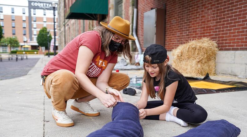 The fifth ChalkFest will feature the return of Project Scare-a-Crow, with 14 scarecrows created by Project Jericho families and community organizations based on the theme of family game night tabletop games. The event will also have people creating unique chalk art on the sidewalks of National Road Commons Park.