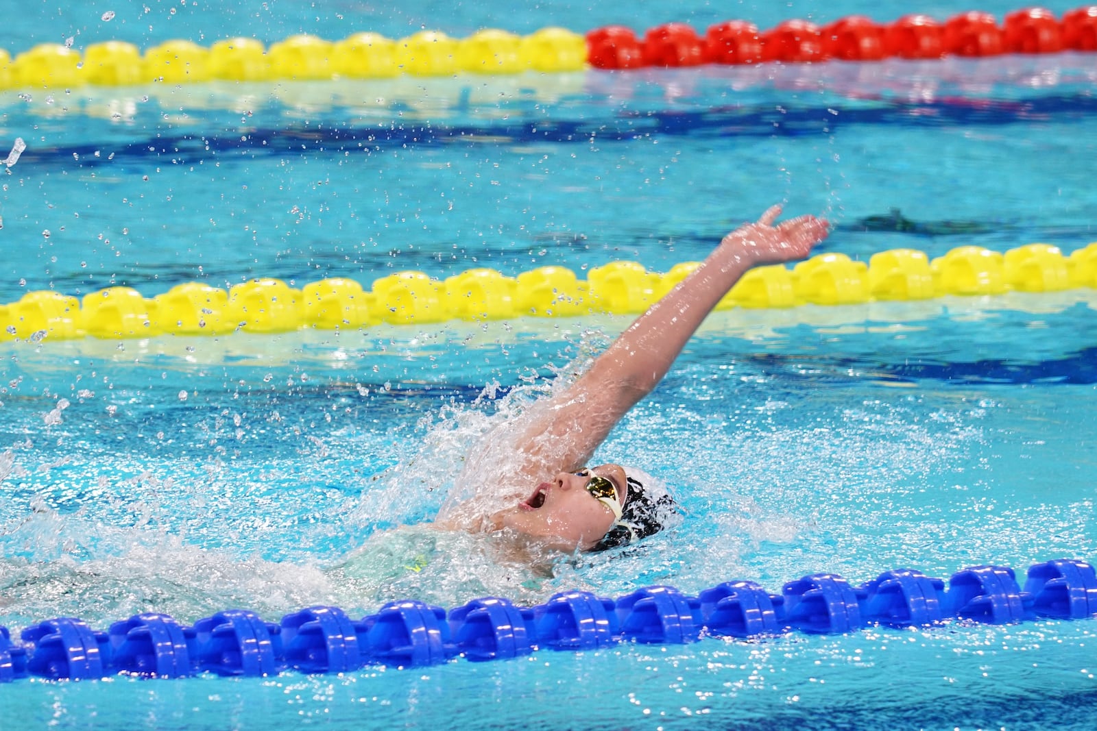 In this photo taken May 24, 2025 and released by Hebei Taihua Jinye Swimming Club, 12 years old Chinese swimmer Yu Zidi competes in the final of the the Women's 400m Individual Medley for the 2025 National Swimming Championships held in Shenzhen in southern China's Guangdong province. (Hebei Taihua Jinye Swimming Club via AP)