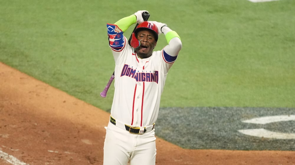 Dominican Republic Geraldo Perdomo reacts after striking out at the end of the ninth inning of a World Baseball Classic semifinal game against the United States, Sunday, March 15, 2026, in Miami. (AP Photo/Rebecca Blackwell)