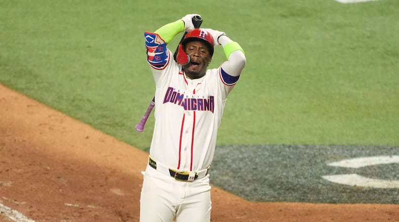 Dominican Republic Geraldo Perdomo reacts after striking out at the end of the ninth inning of a World Baseball Classic semifinal game against the United States, Sunday, March 15, 2026, in Miami. (AP Photo/Rebecca Blackwell)