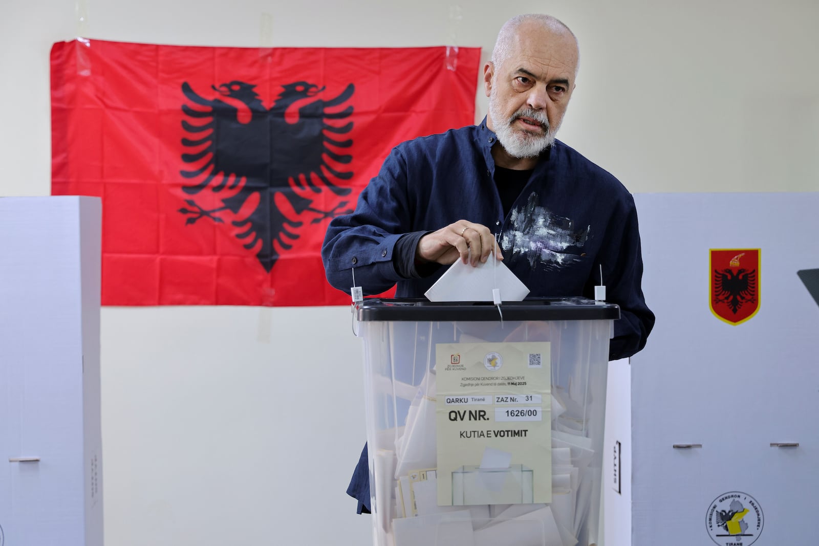 Albania's ruling Socialist party leader Edi Rama casts his ballot during a general election where Rama is seeking a fourth term as Albania's prime minister, in Tirana, Sunday, May 11, 2025. (AP Photo/Vlasov Sulaj)