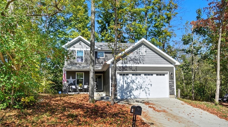 This newer three-bedroom home in Northridge is being offered with an additional wooded lot and has 1,558 square feet of living space. CONTRIBUTED