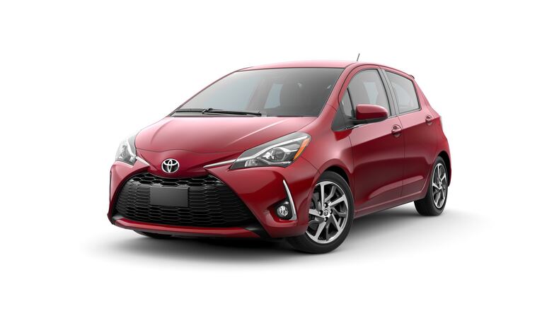 The 2018 Yaris is the Toyota brand s least expensive model and offers both three-door and five-door body styles in two grades, L and LE, in addition to the five-door Sporty SE. Manual transmission is available on the three-door L and the five-door SE. Toyota photo