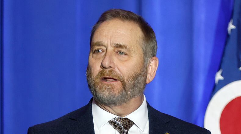 FILE - Ohio Attorney General Dave Yost speaks during an election night watch party, Nov. 8, 2022, in Columbus, Ohio. Ohio's top lawyer has advised the state's public universities that a law written to deter Ku Klux Klan demonstrations could be used to impose felony charges on students who wear face coverings while protesting the war in Gaza. (AP Photo/Jay LaPrete, File)