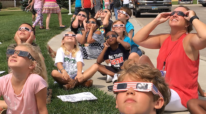 Students at Horace Mann Elementary gather outside Aug. 21, 2017, to watch the solar eclipse. Bill Lackey/Staff