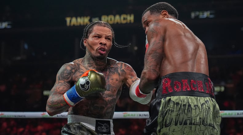 FILE - Gervonta Davis, left, punches Lamont Roach during the third round of a WBA lightweight championship boxing bout Saturday, March 1, 2025, in New York. (AP Photo/Frank Franklin II, File)