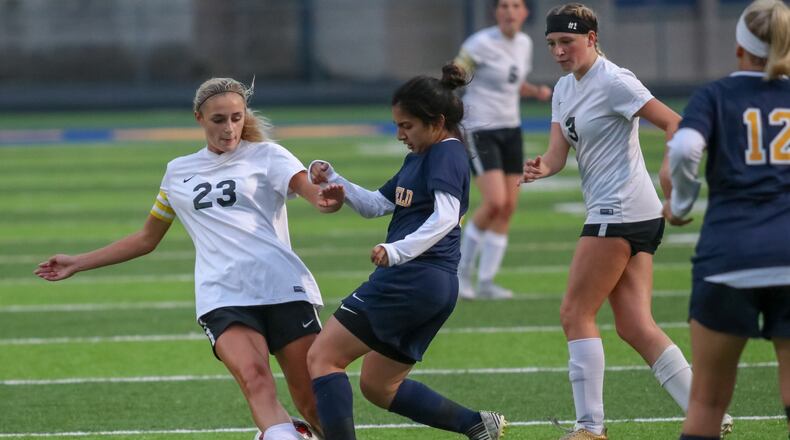 Greenon High School’s Madyson Fagan battles for the ball during the Knights 8-2 victory at Springfield High School on Sept. 10. The Knights (6-0) are off to their best start since 2008. Michael Cooper/CONTRIBUTED