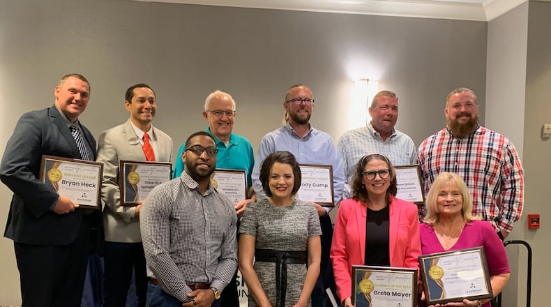 Leadership Clark County held its second annual Community Connection Awards June 5. The award winners and others in the photo are (back row, from left): Bryan Heck, Springfield city manager; Cris Lopez, Chick-fil-A franchise owner; Vince Chase, Springfield Rotary Club; Jody Gump, Wesbanco Bank; Mike Stannard, McMann Smoot Riddle Insurance; Josh Reynolds, McMann Smoot Riddle Insurance; (front row, from left) Raphael Allen, Springfield Foundation director of community outreach; Leigh Anne Lawrence, Leadership Clark County executive director; Greta Mayer, Mental Health and Recovery Board of Clark and Madison Counties; and Kerry Pedraza, United Way of Clark, Champaign and Madison Counties. Brooke Spurlock/Staff