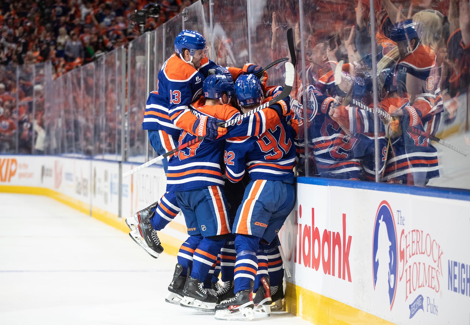 Edmonton Oilers players celebrate Darnell Nurse's goal against the Los Angeles Kings during the second period of an NHL hockey game in Edmonton, Alberta, Thursday, May 1, 2025. (Jason Franson/The Canadian Press via AP)