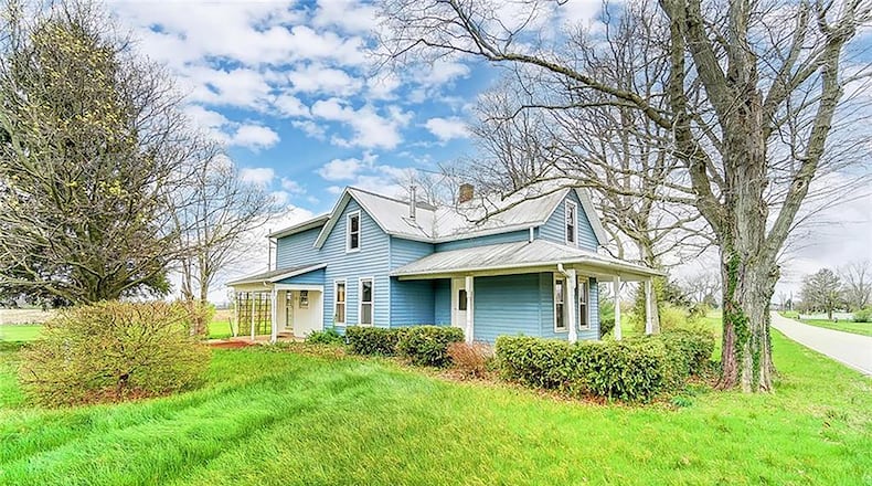 The 4-bedroom home offers about 2,070 sq. ft. of living space. The home features a wrap-around porch and updated flooring inside. CONTRIBUTED PHOTO