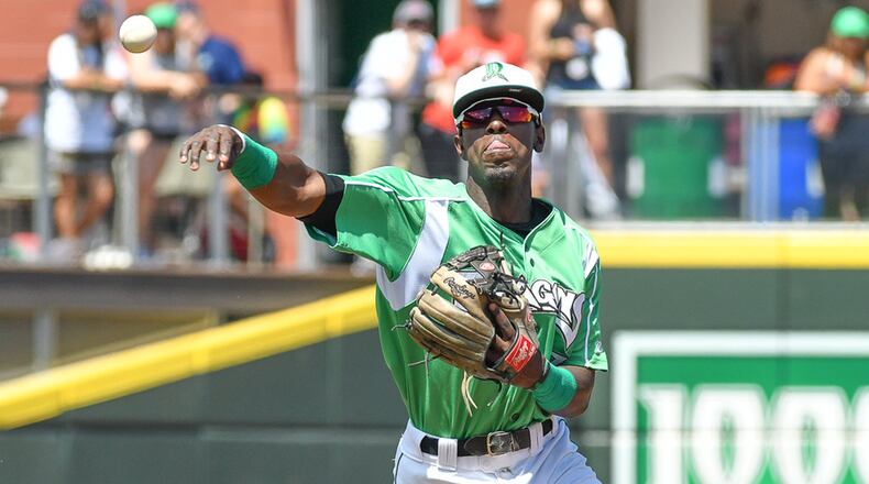 Hector Vargas throws to first base during the fourth inning of a game against South Bend on Sunday at Fifth Third Field. Contributed Photo by Bryant Billing