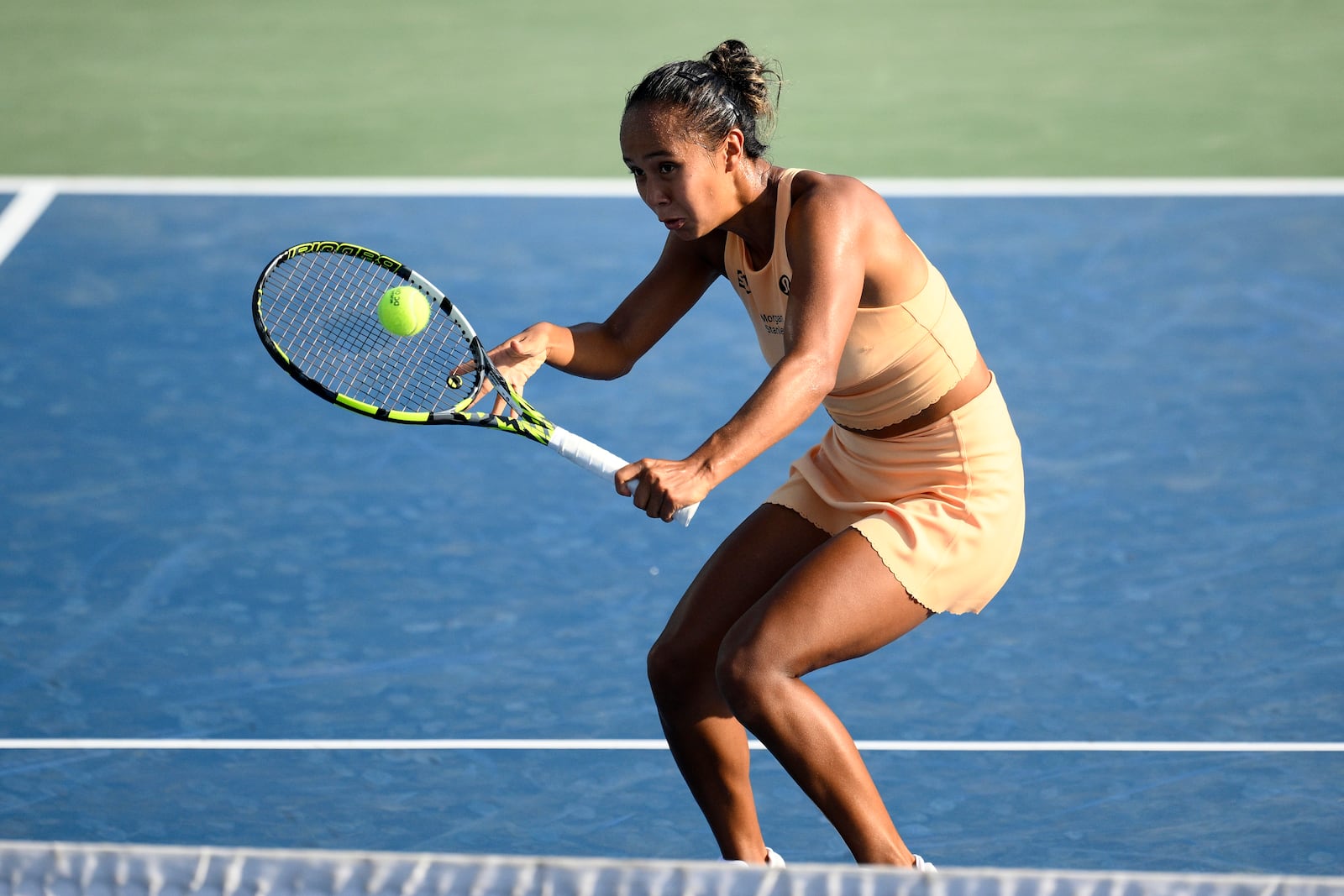 Leylah Fernandez, of Canada, returns the ball against Jessica Pegula during a match at the Citi Open tennis tournament Thursday, July 24, 2025, in Washington. (AP Photo/Nick Wass)