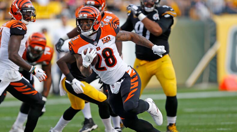 Cincinnati Bengals running back Joe Mixon (28) carries the ball during the first half of an NFL football game against the Pittsburgh Steelers in Pittsburgh, Sunday, Oct. 22, 2017. The Steelers won 29-14. (AP Photo/Keith Srakocic)