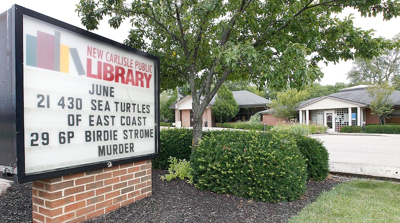 The New Carlisle Public Library is asking local governments to support changing the local split of the state’s public library funding to help it expand after the Clark County Public Library denied its request. BILL LACKEY/STAFF
