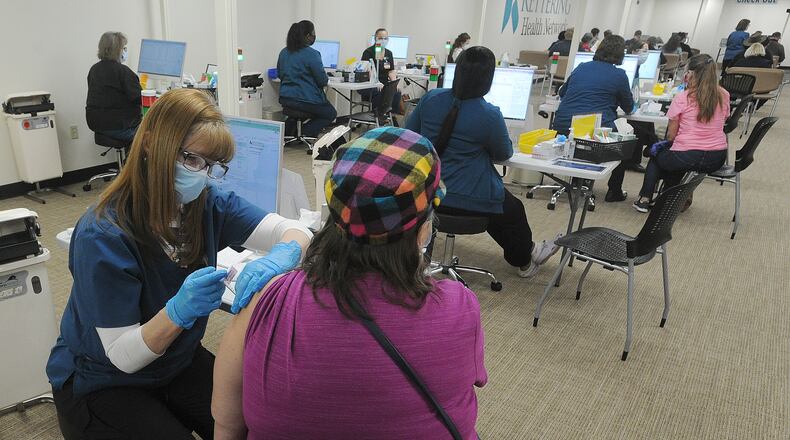 Kettering Health Network, held a COVID-19 vaccine clinic at Greene Memorial Hospital in Xenia, Thursday, March 11, 2021. MARSHALL GORBY\STAFF