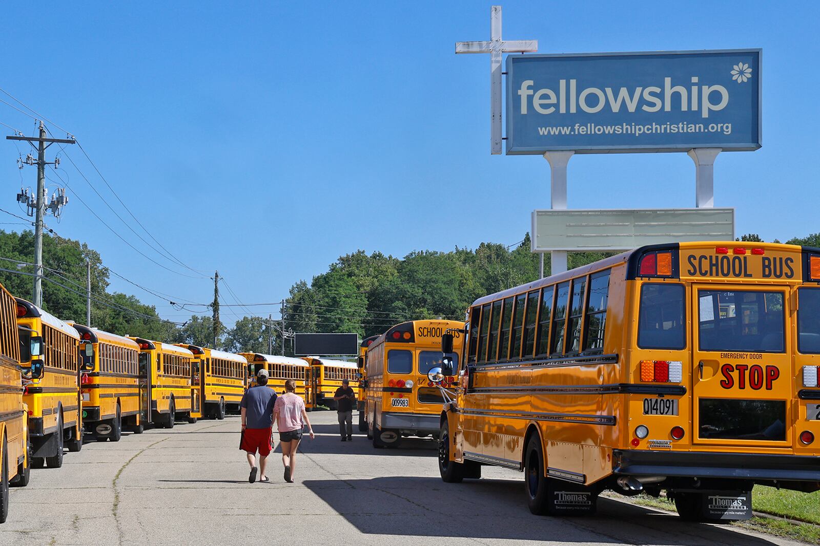 The Fellowship Christian Church was surrounded by 37 school buses Monday, August 28, 2023 during the funeral for 11-year-old Aiden Clark, who was killed in a fatal Northwestern school bus crash last week. BILL LACKEY/STAFF