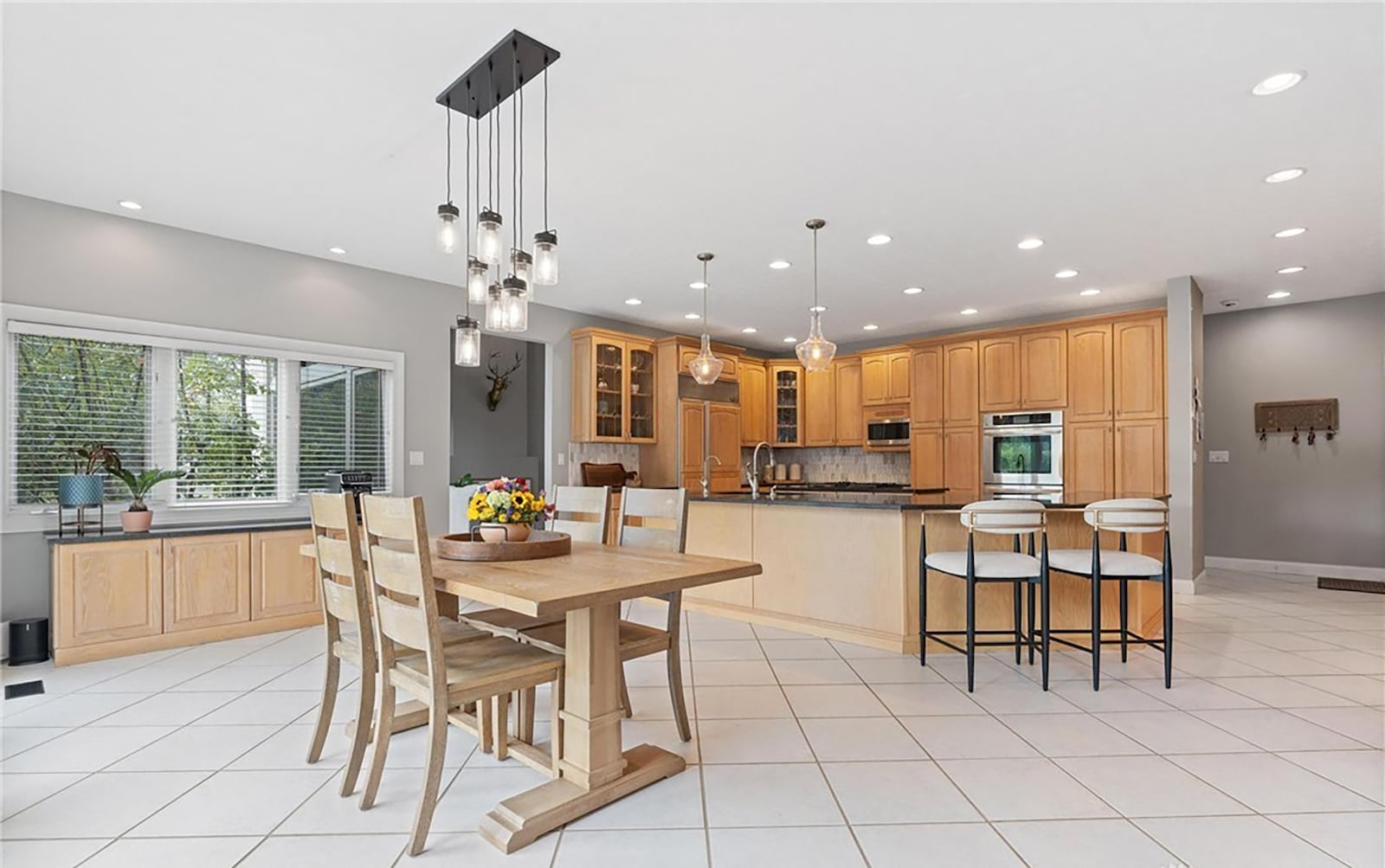 The eat in kitchen has a built in coffee bar, stainless appliances and a island with a breakfast bar. CONTRIBUTED
